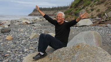 Senior Enjoying a Rocky Beach